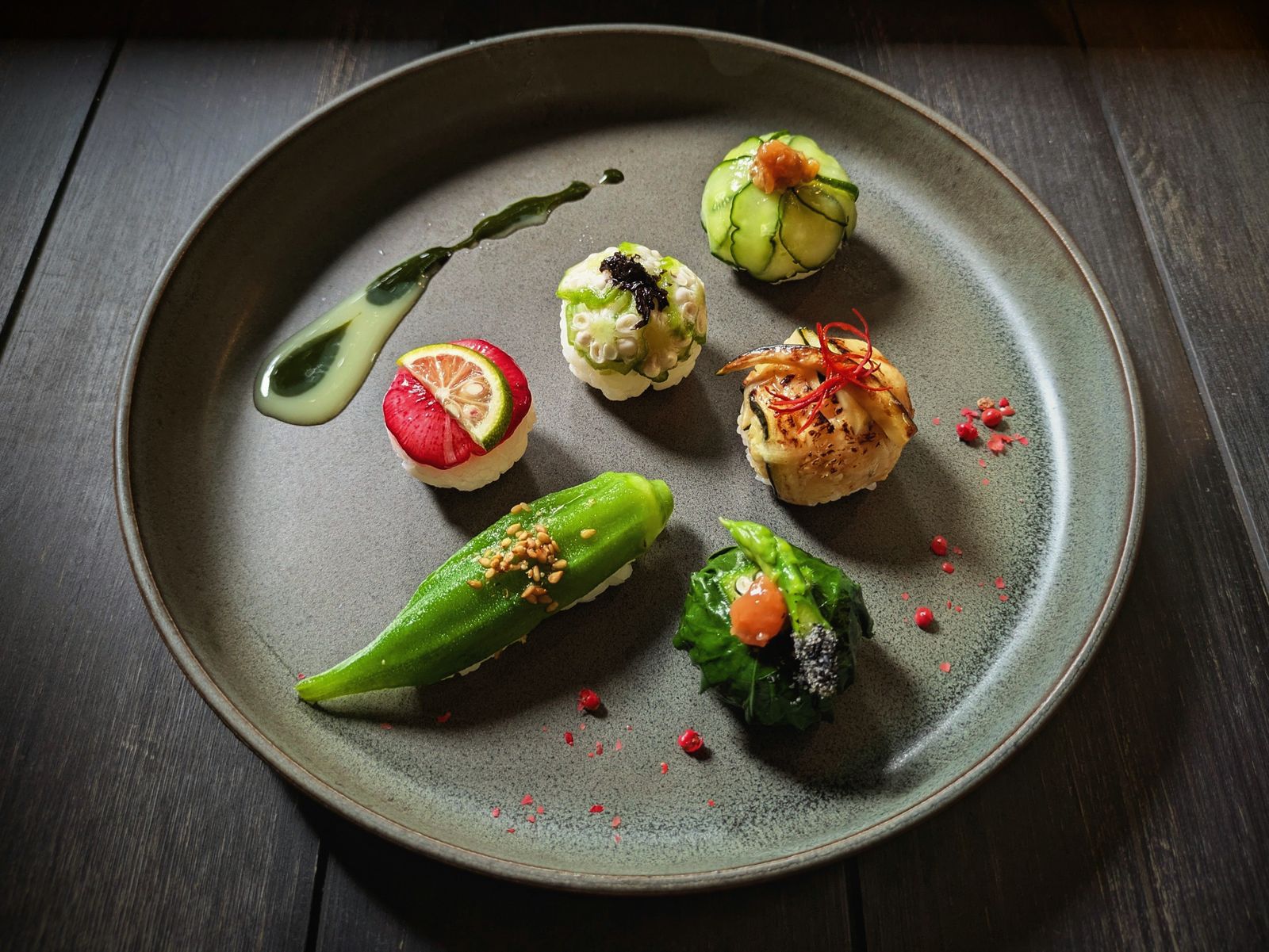 A gourmet sushi platter on ceramic