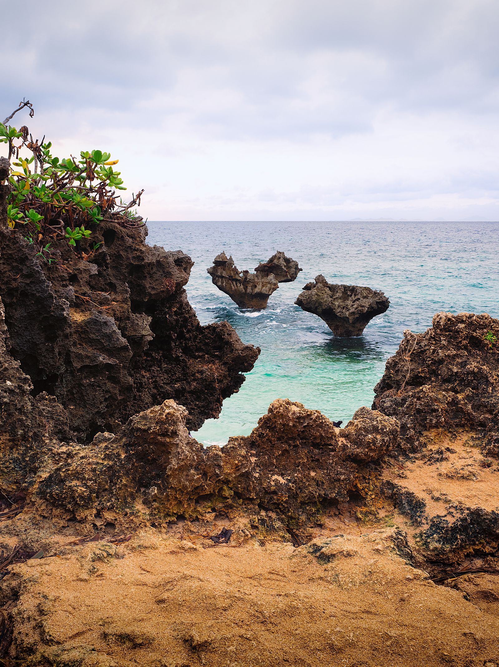 Heart-shaped rocks and turquoise water at Kouri Island, Okinawa